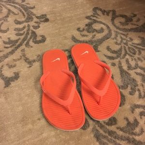 orange nike slides womens